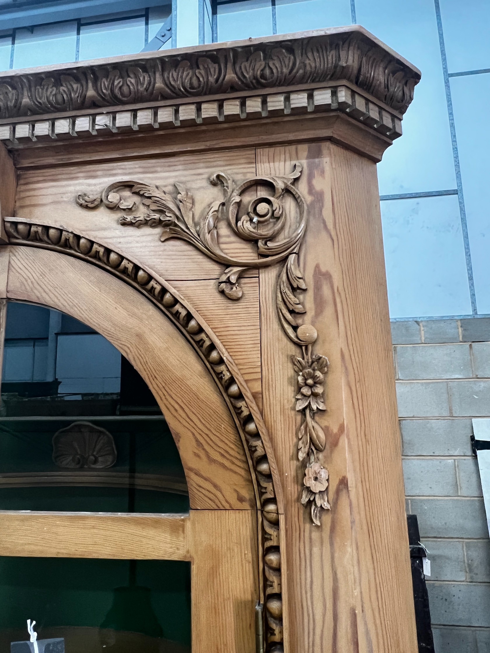 A George III style pine barrel back standing corner cabinet, width 100cm depth 32cm height 207cm
